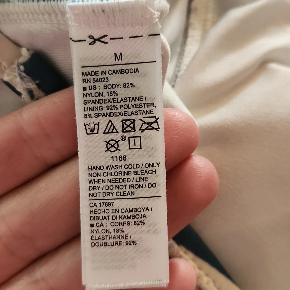 Old Navy Twist front one piece swimsuit, size medium‎